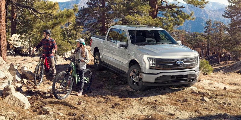 Ford F-150 Lightning being used for a remote mountain biking trip